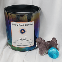 Load image into Gallery viewer, coconut soy candle with wooden wick 12 oz aura vessel- text candle name Soul, white prop background, white sage and lavender fragrance
