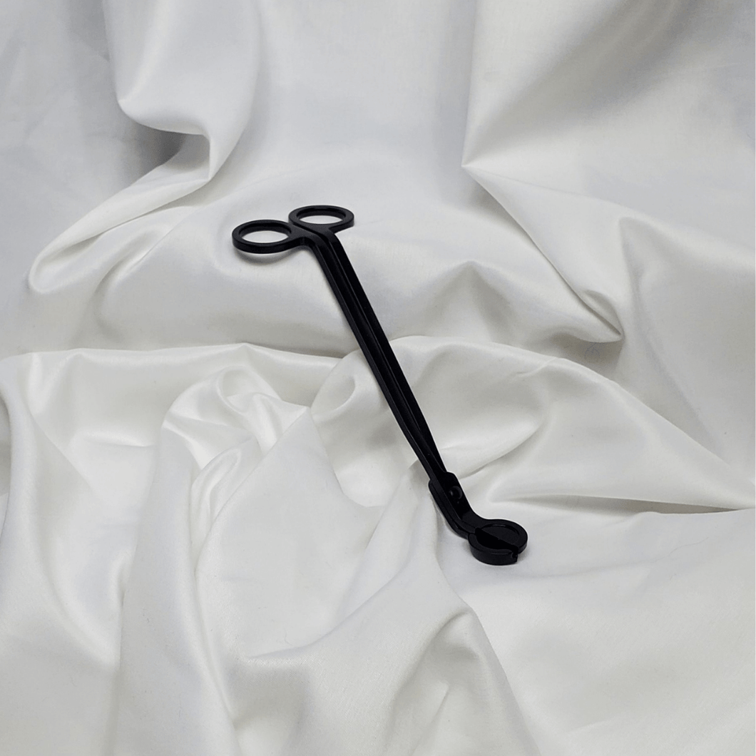 black matte wick trimmer with white background